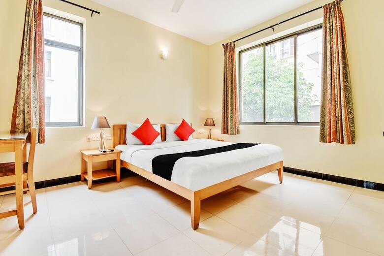Hotel Capital O 49932 Orchard Suites