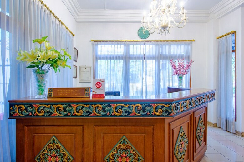 Hostal Oyo 1602 Trim Tiga Hotel