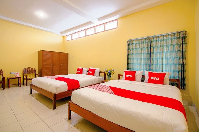 Hostal Oyo 1602 Trim Tiga Hotel