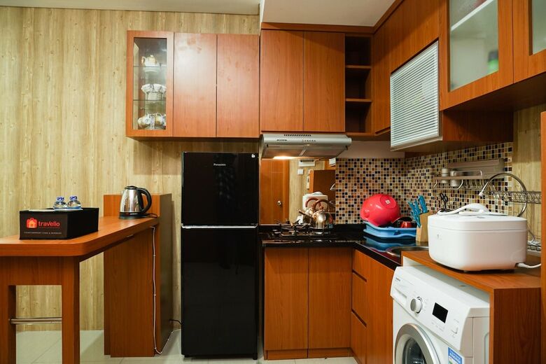 2br Apartment With Sofa Bed At Woodland Park Residence