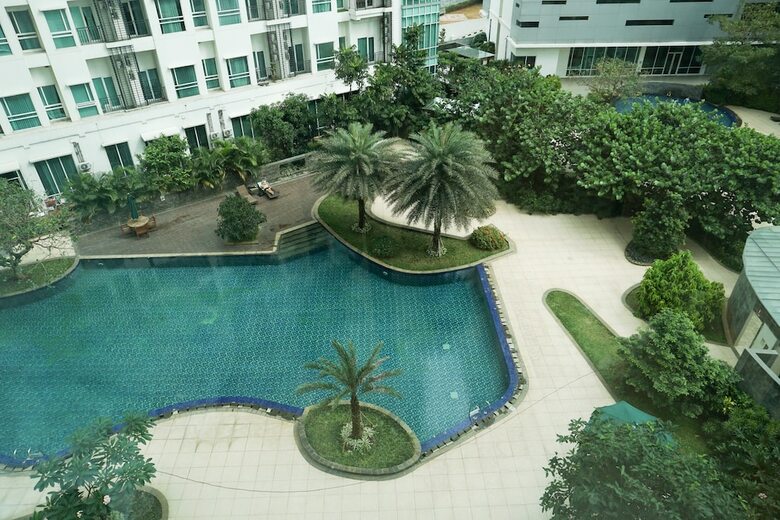 2br Apartment With Sofa Bed At Woodland Park Residence