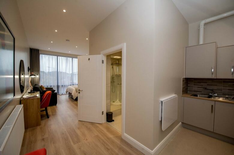 Apartamentos The James Suites
