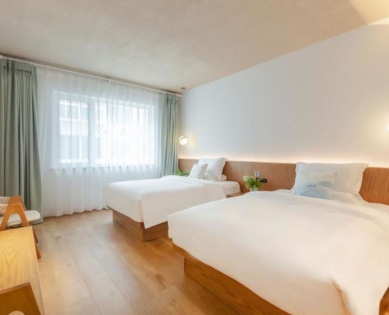Floral Hotel Jing Hai Man Ju Qingdao