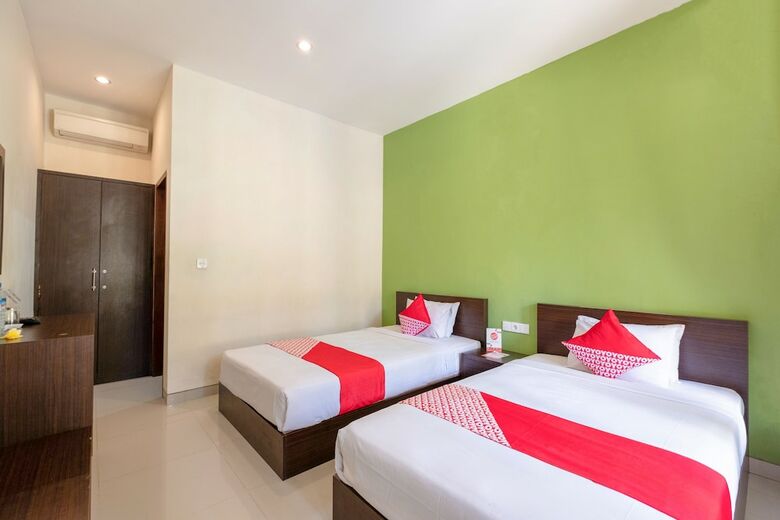 Oyo 1508 Mascot Beach Hotel