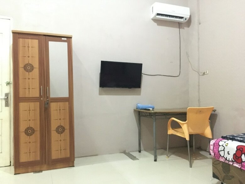 Hostal Oyo 1883 Mulia Tiza