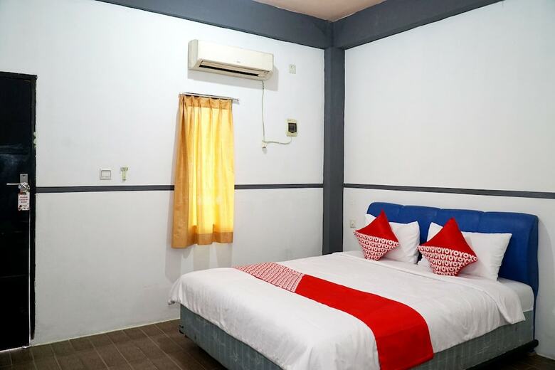 Hostal Oyo 1861 Martha Guest House