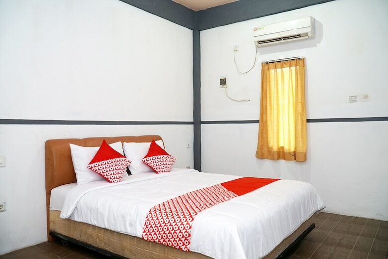Hostal Oyo 1861 Martha Guest House