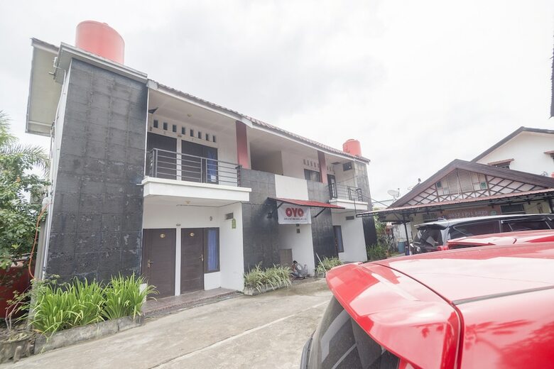 Hostal Oyo 2187 Hm Guest House