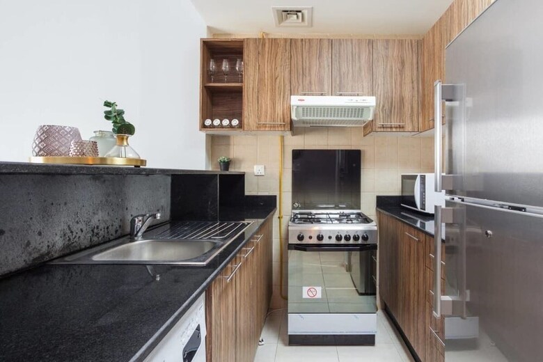 Apartamento Cosy & Convenient Apt In Downtown Dubai