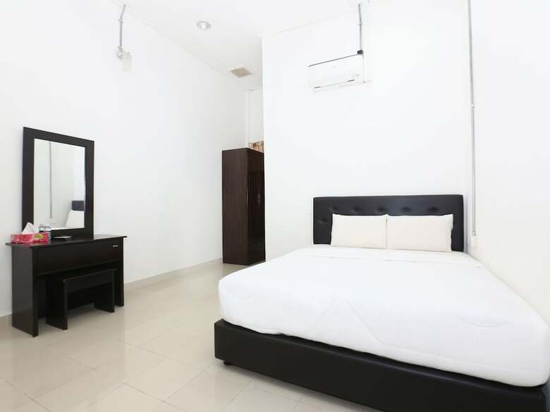 Spot On 89778 Aisy Hotel