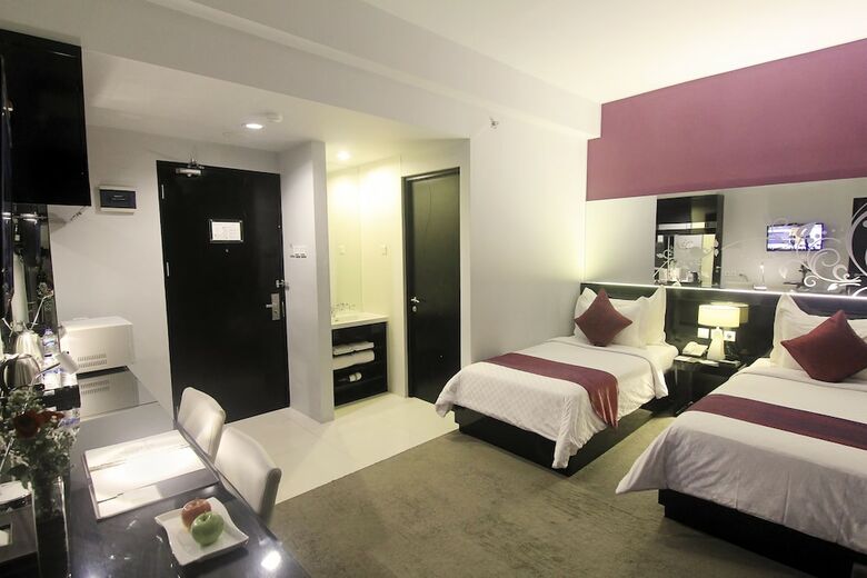 Hotel Grand Darmo Suite By Amithya