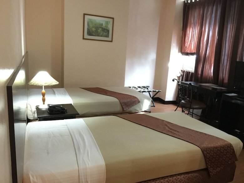 Golden Peak Hotel & Suites