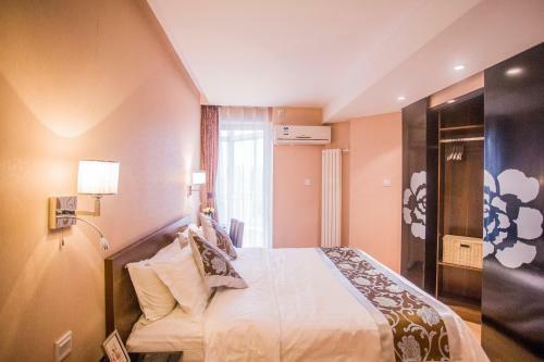 Apartamentos Beijing Guangyao Hotel