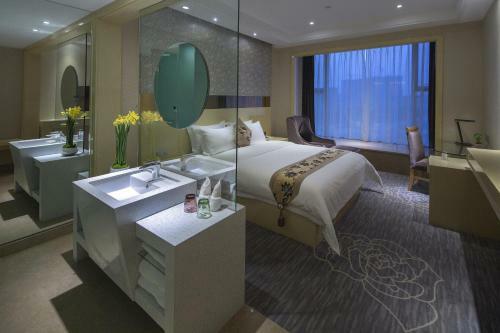 Paco Business Hotel Luo Gang Wan Da Branch