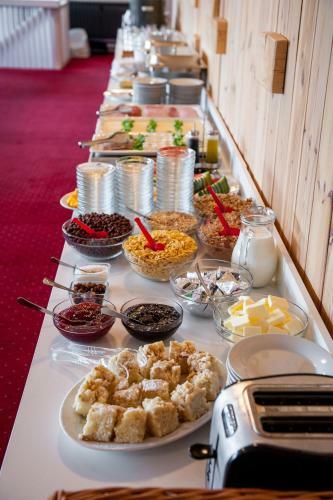 Hotel Horn� Pramen