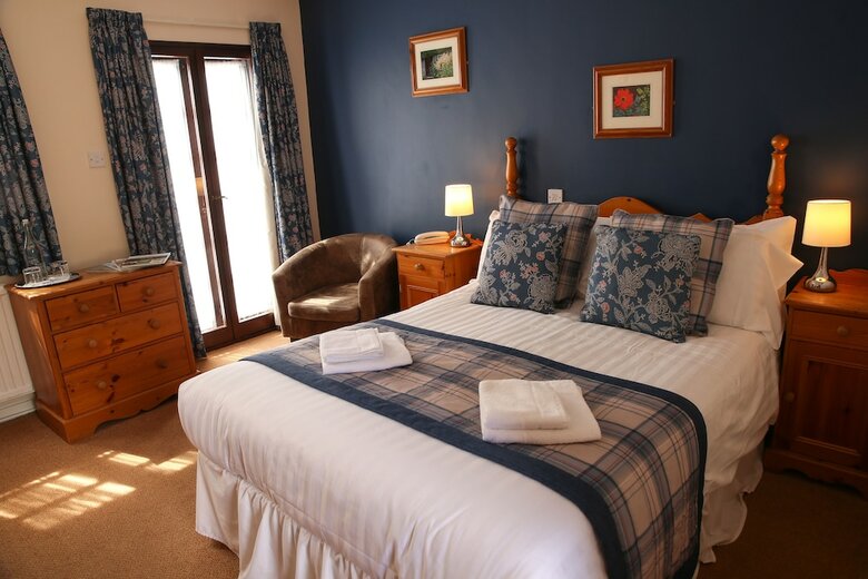 Posada The Greyhound Inn & Hotel