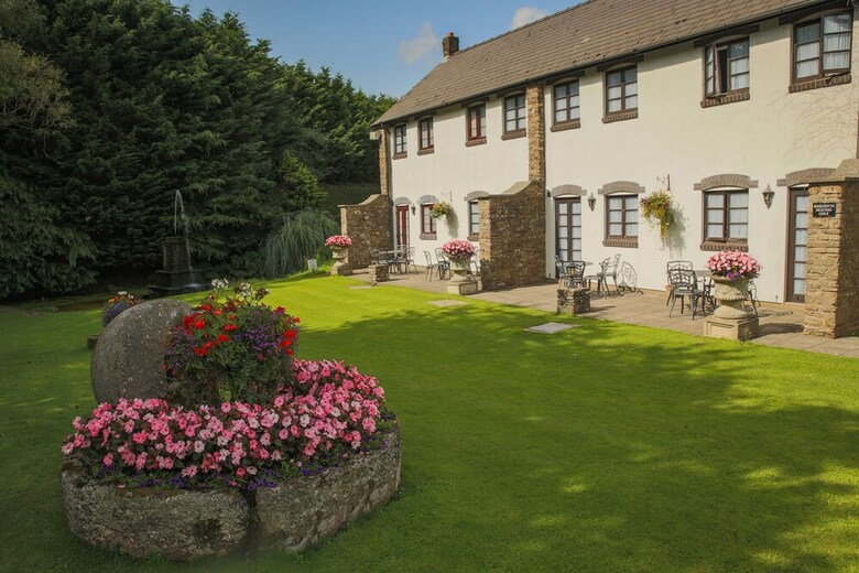 Posada The Greyhound Inn & Hotel