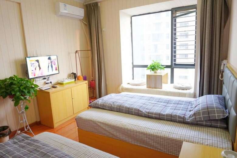 Hostal Wuhan Huanlesong Youth Hostel