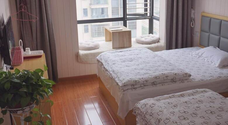 Hostal Wuhan Huanlesong Youth Hostel