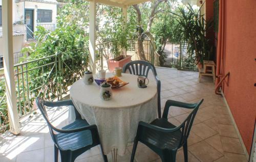 Three-bedroom Holiday Home In Artemida