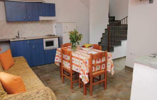 Two-bedroom Holiday Home In Andreas Paralio