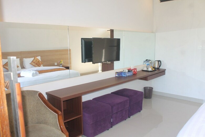 Hotel Mandhasativa Homestay