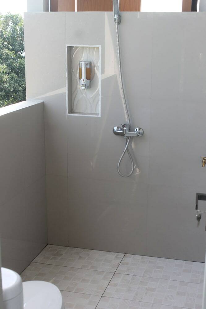 Hotel Mandhasativa Homestay