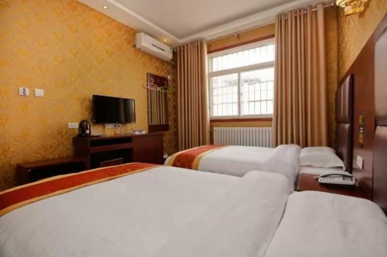 Posada Jiacheng Business Hotel