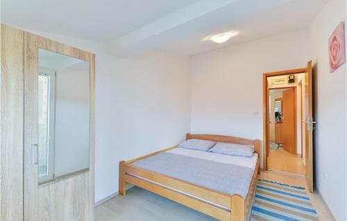 Two-bedroom Apartment In Povljana