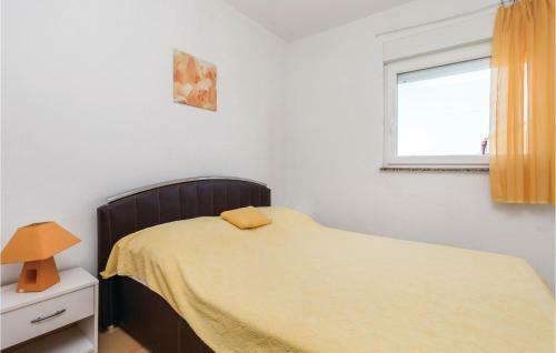 Two-bedroom Apartment In Povljana