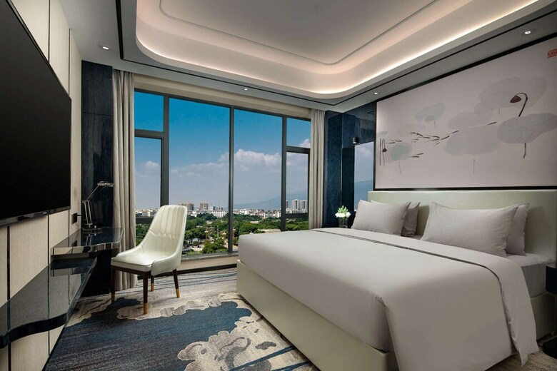 Hotel Ramada By Wyndham Mengzi Suites