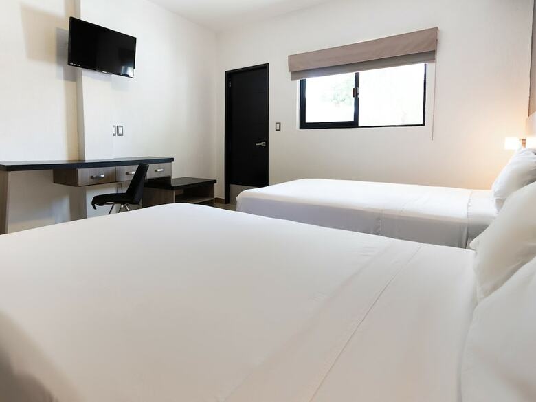 Capital O Hotel Mango