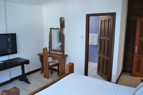 Aparthotel Cowrie Shell Beach Apartments