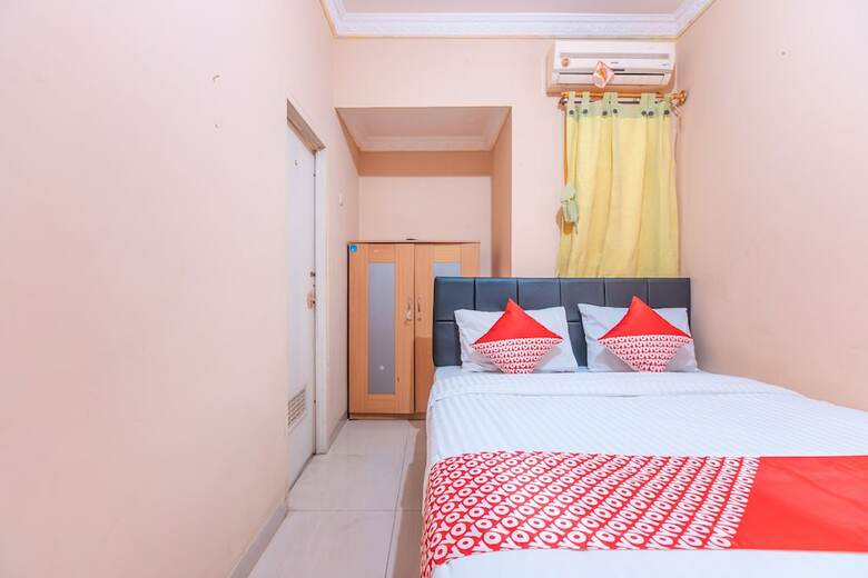 Hostal Oyo 2765 Mulia Raja Kost