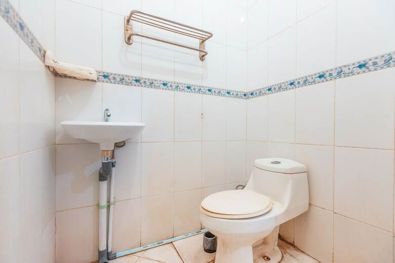 Hostal Oyo 2765 Mulia Raja Kost