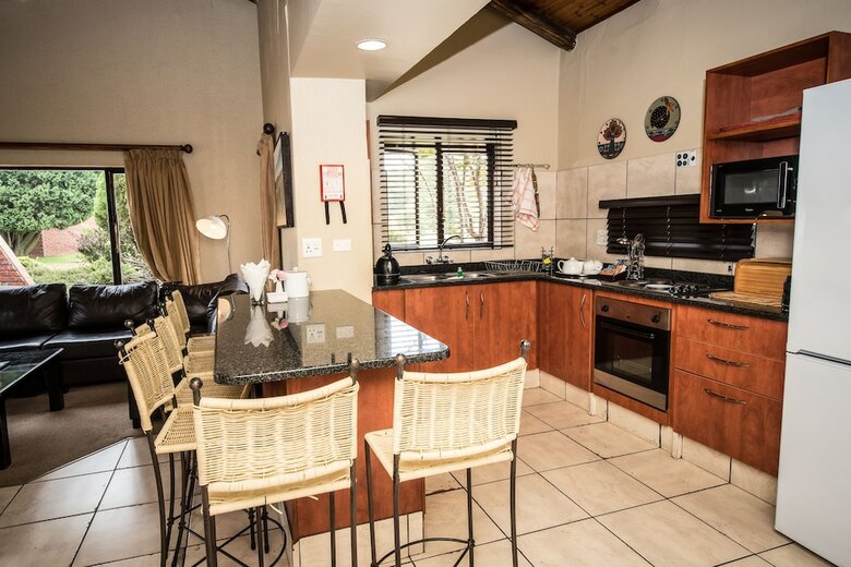 Apartamentos First Group Qwantani