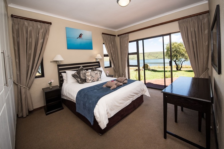 Apartamentos First Group Qwantani