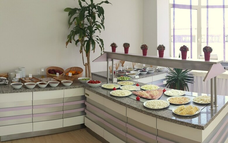 Kamer Suite & Hotel