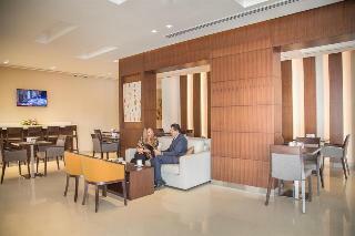 Capital O Action Hotel