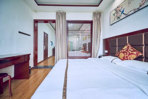 Hostal Jiuqi Guest House (????)