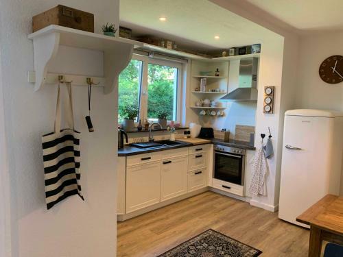 Apartamento Ferienwohnung Alte Fehnapotheke, 95144