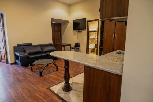Suites & Hotel El Quijote