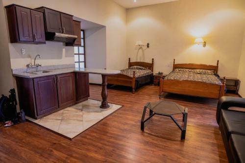 Suites & Hotel El Quijote