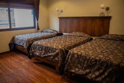 Suites & Hotel El Quijote