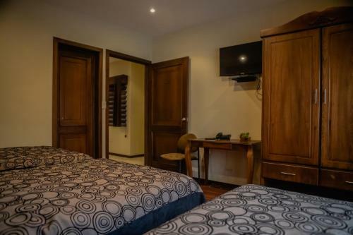 Suites & Hotel El Quijote