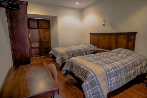 Suites & Hotel El Quijote
