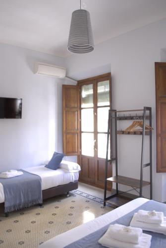 Pension La Perla Granada Suites