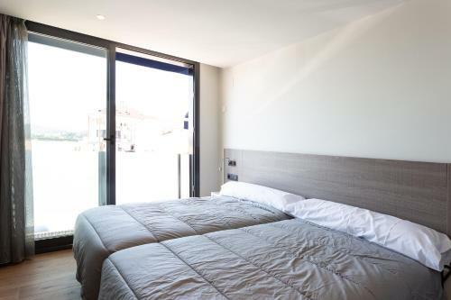 Apartamentos Playa De Los Barcos