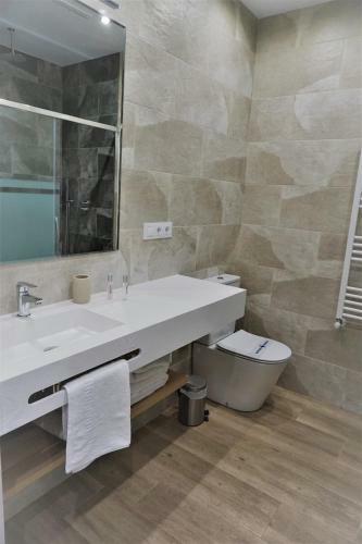 Apartamentos La Playina