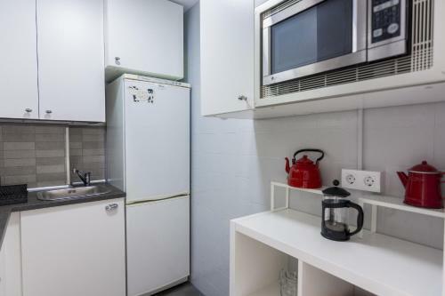 Apartamento Homeholidaysrentals Regard